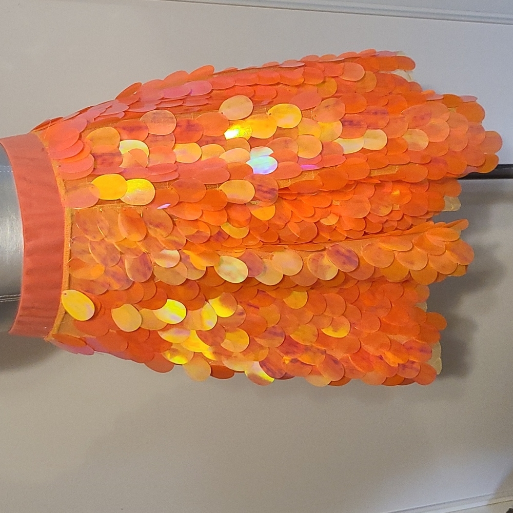 Bright &fun Designer Maggie Barry custom made orange sequence swing skirt.